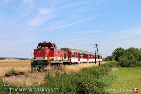 Near Vycapy, ZSSK 736.104 is seen hauling the local train 5014 from Topol'cany to Nitra