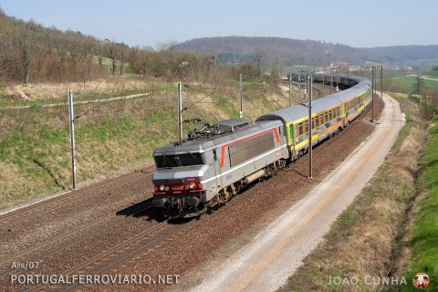 A colourful Corail Teoz from Strasbourg to Paris-Est is seen with BB 15050 at Nançois