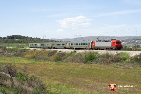 Near Celorico da Beira, 5612 hauls Intercity 511 from Lisboa heading to Guarda