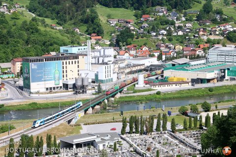 A Flirt unit from SZ 510 series crosses the Savinja river and a Brigitte 363 in a service between Maribor and Ljubljana