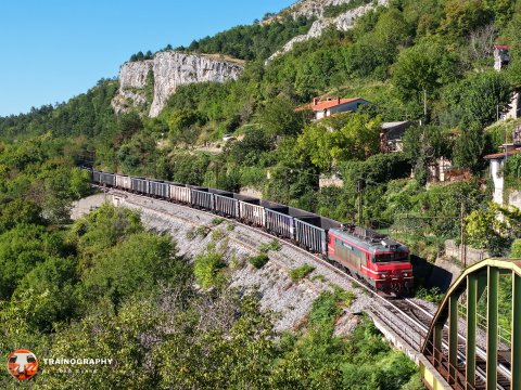 363.035 passes the Podpec bridge with an empty coal train to Koper