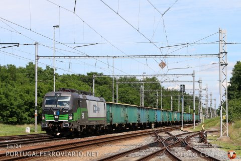A coal train is seen at Rohatec with ELL 193.760, a locomotive rented to CD Cargo