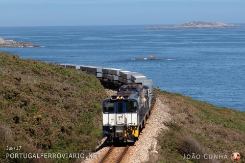 Aluminium train from Xove to Bilbao running with number 73151 by Burela with 1614+1613 ahead